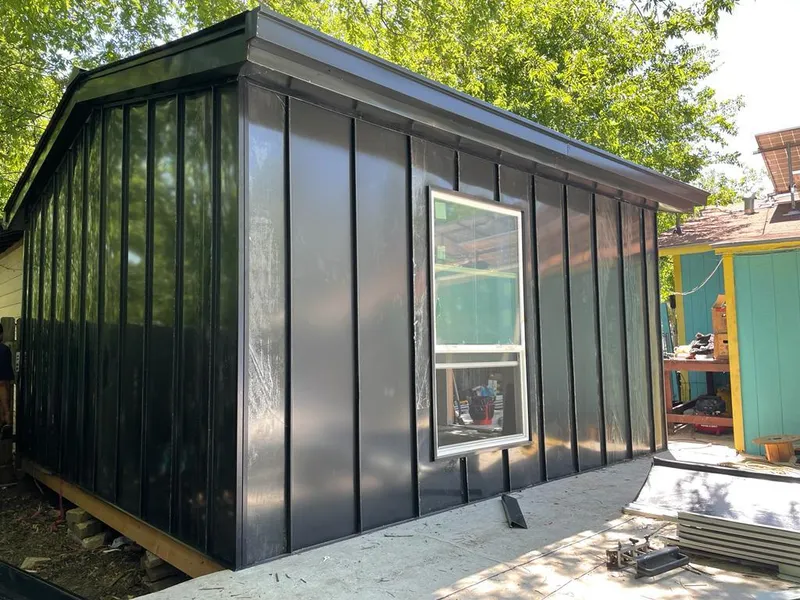 Black standing seam metal wall panels for Metal Roof Installation in Kyle